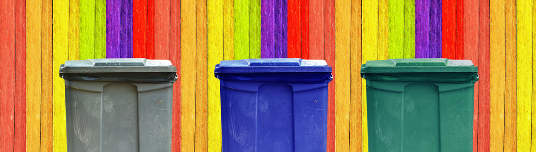 waste bin, recyclable bin and compost bin with colorful backdrop