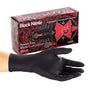 Black Widow powder free nitrile glove in front of the inner box of 100